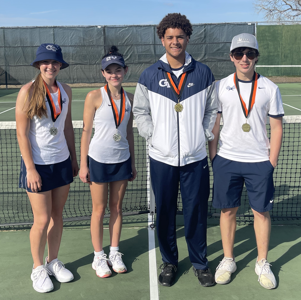 Riley Bohl, Kate Billo, Devonte Perry and Hunter Williams pose for a photo after bringing home wins at the Orange Grove Oz Memorial Invitational Tournament Wednesday.