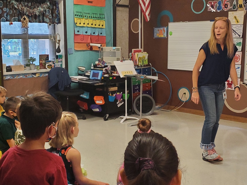 Mrs. Janssen teaches Kinder students about keeping a beat.